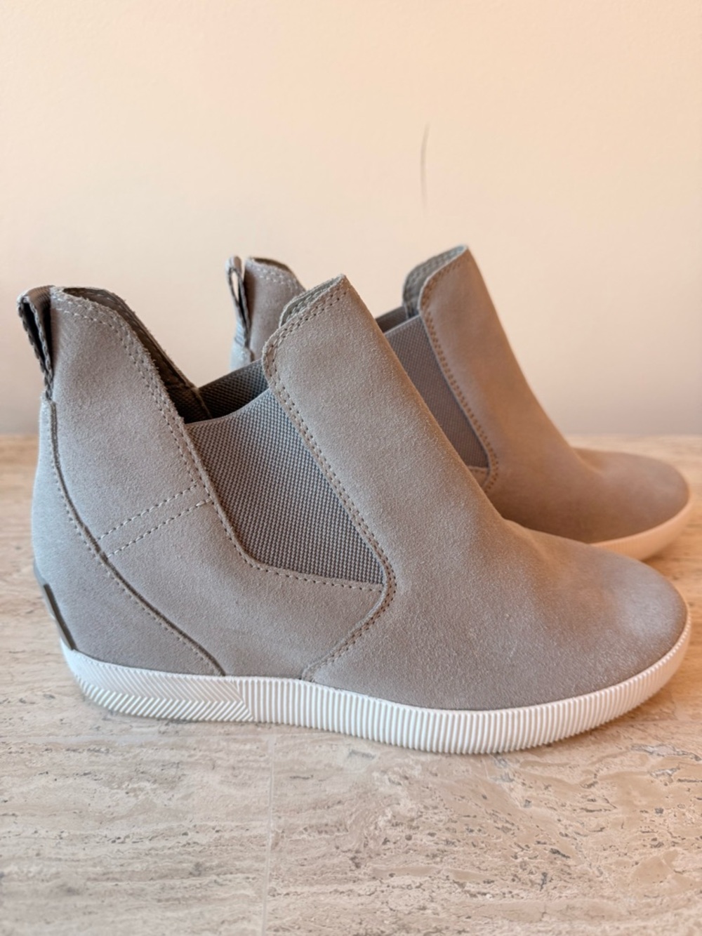 Sorel taupe and off-white wedge bootie